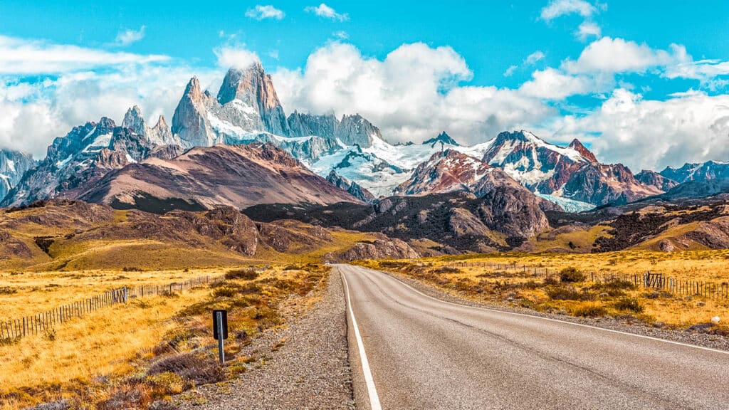 Road at the entrance to El Chalten with Fitz Roy in the background.